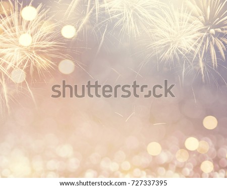 Gold Vintage Fireworks and bokeh in New Year eve and copy space. Abstract background holiday.