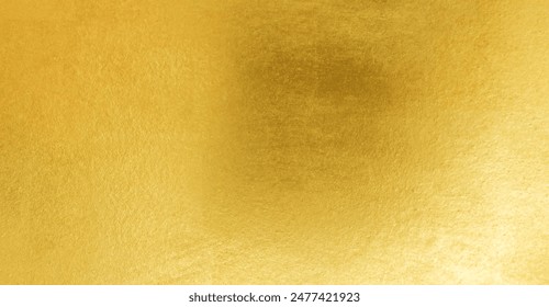 Gold wall texture background Yellow shiny gold foil paint on wall sheet