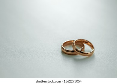 Gold Wedding Rings. The Concept Of Marriage, Family Relationships, Wedding Paraphernalia