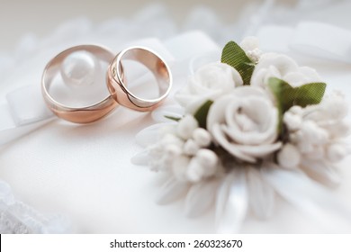 Gold wedding rings. Wedding symbols, attributes. Holiday, celebration