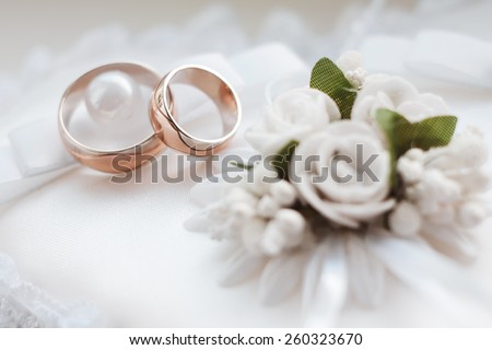 Gold wedding rings. Wedding symbols, attributes. Holiday, celebration