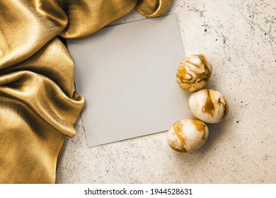 Gold And White Painted Easter Eggs Folded In Golden Silky Scarf With Greeting Card