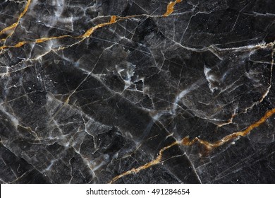 Gold and white Patterned natural of dark gray marble (Gold Russia) texture background for product design.