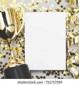 Gold Winners Trophy With A Blank Poster Label And Golden Shiny Stars