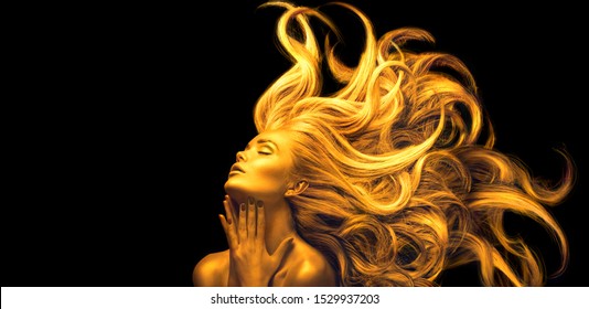 Gold Woman. Beauty fashion model girl with Golden make up, Long hair on black background. Gold glowing skin and fluttering hair. Metallic, glance Fashion art portrait, Hairstyle. Fashion art design