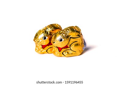 Gold Wrapped Chocolate Easter Bunny Isolated On White Background