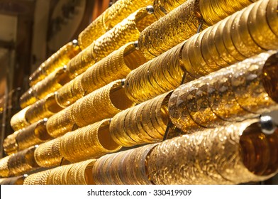  Golden Accessories In The Display Window Of A Jewelery Store