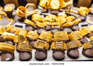 Golden Accessories In The Display Window Of A Jewelery Store