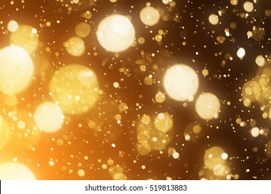 Golden background. Defocused lights