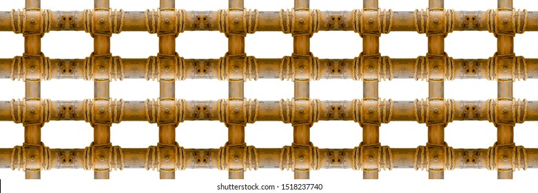 Golden bamboo fence with white rope on white background use for house decoration and exterior background 
