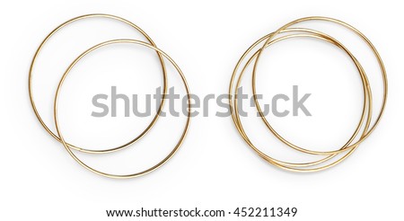 Golden bangles arranged. Isolated object on white background. 