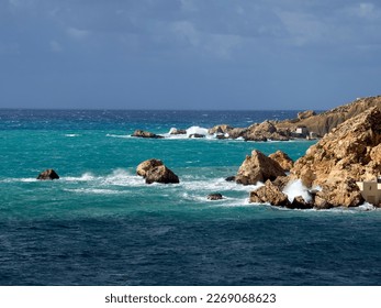 Golden Bay beach  Maltese islands  landscape  windy cloudy weather
