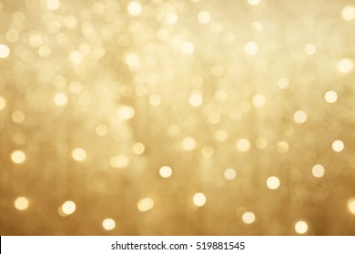 Golden Beautiful Blurred Bokeh Background With Copy Space. Holiday Texture. Wallpaper. Glitter Light Spots On Golden Background, Defocused