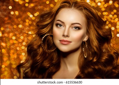 Golden beautiful fashion woman, model with shiny  healthy long volume hair. Waves curls updo volume hairstyle. Hair Salon.Girl with luxurious haircut on  gold background
