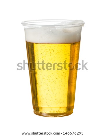 Golden beer, ale or lager in a plastic disposable cup or glass for party concert or by pool for safety