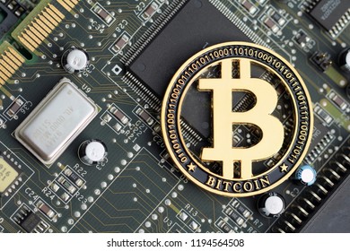 Golden Bitcoin Cryptocurrency On Computer Electronic Stock Photo