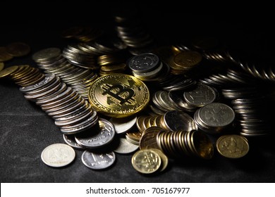Golden bitcoin with money coins background. conceptual image for crypto currency.