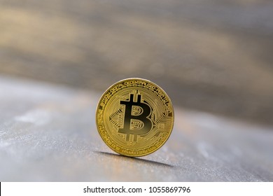  golden bitcoin on abstract background