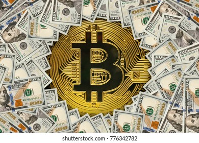 Golden Bitcoin On Us Dollar Bills