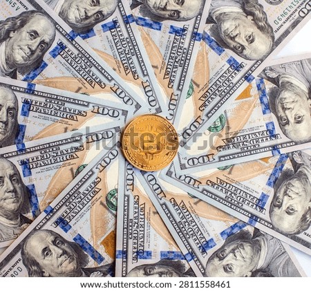 Golden Bitcoin token placed onbanknotes with visible US dollar currency in the background, illustrating cryptocurrency investment, digital assets, international finance, inflation, exchange rates, blockchain technology and modern financial markets. Suitable for business, banking and fintech concepts.