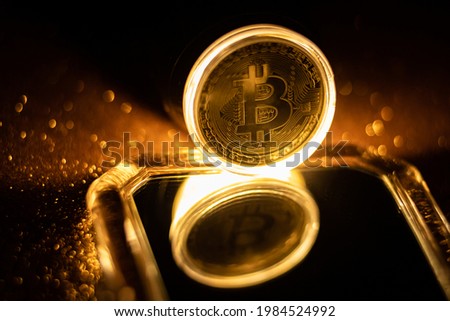 golden Bitcoin virtual money concept.Burning bitcoin symbol. Decentralised Cryptocurrency logo of BTC coin. 