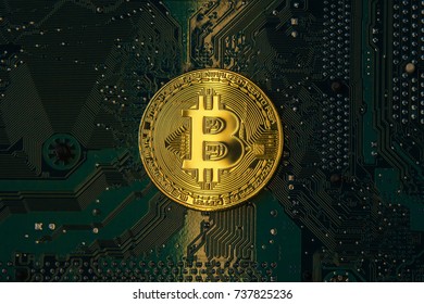 Golden Bitcoins On The Chip The Green Background Crypt Of Safety Virtual Money Mining Security