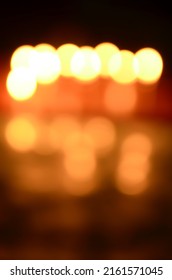 Golden Bokeh Background From Candlelight