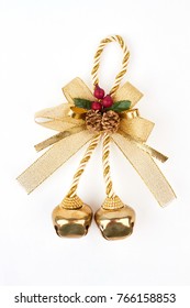 Golden Bow With Jingle Bells. Golden Jingle Bells On A Rope With A Bow Isolated On A White Background. Shiny Golden Christmas Bells Decorations.