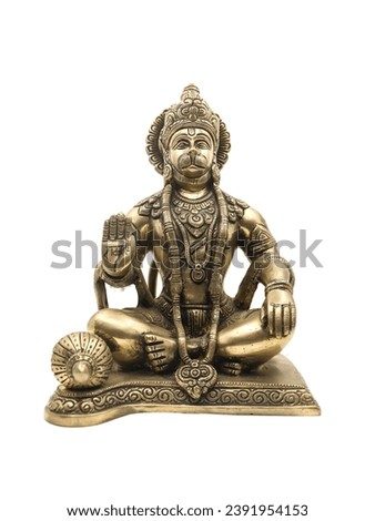golden brass lord hanuman statue, a monkey god from ramayana of hindu mythology sitting and blessing made of isolated 
