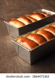 Golden Brown Bread In Baking Loaf Tin