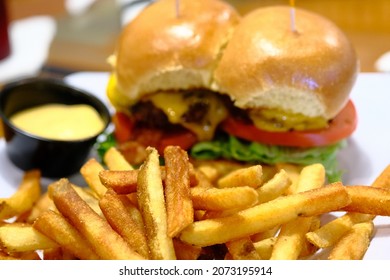 Golden Brown French Fries And Cheeseburger Sliders