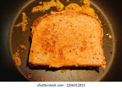 Golden Brown Grilled Cheese Sandwich In Frying Pan. Top View