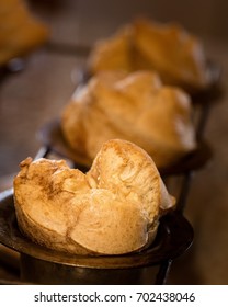 Golden Brown Popovers In Pan With Shallow Focus