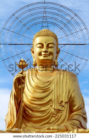 Golden Buddha with blue sky