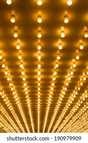 Golden Bulbs Marquee Lights Background