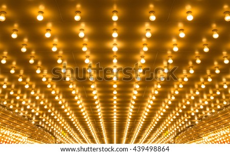 golden bulbs marquee lights background