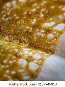 Golden Cannabis Rosin On Parchment Paper