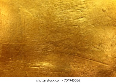 golden cement texture background - Shutterstock ID 704945056