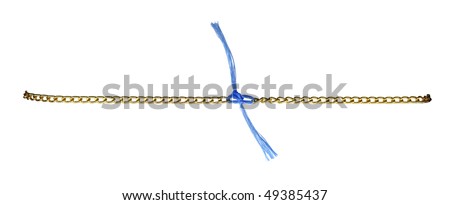Golden chainlet with blue rope isolated on white background. Accessories for sewing and scrapbooking decorations