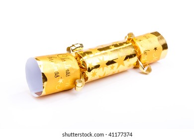 Golden Christmas Cracker Isolated Against White Background.