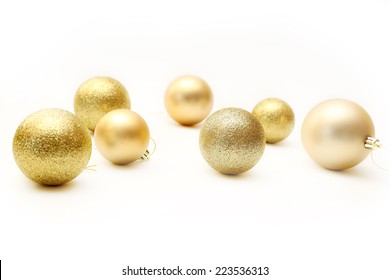 Golden Christmas Ornaments isolated on white  - Powered by Shutterstock