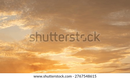 Golden Clouds at Sunset. Sky Background