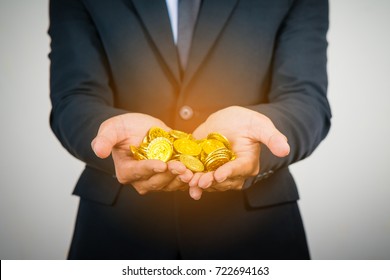 Golden Coin On Hand Businessman