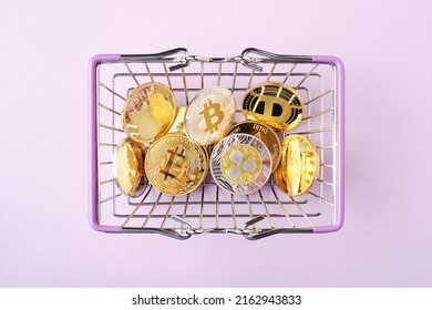 Golden coins of cryptocurrencies, altcoins and bitcoins in shopping basket on purple background. Buy, sale or cryptocurrencies exchange concept. - Shutterstock ID 2162943833
