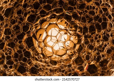 Golden color abstract background of clear water bubbles, molecular structure. Physics, chemistry technology background.