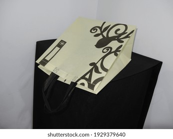 Golden Color Non Woven ECO Shopping bag with black background. site guest view box Bag - Shutterstock ID 1929379640