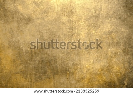 Golden colored background grunge texture 