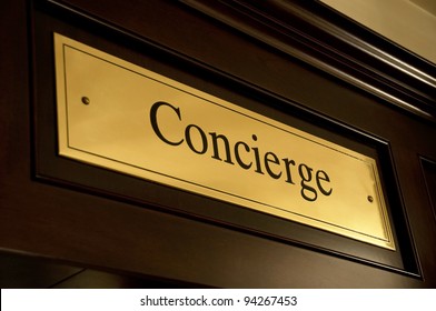 Golden Concierge Sign In A Luxury Hotel