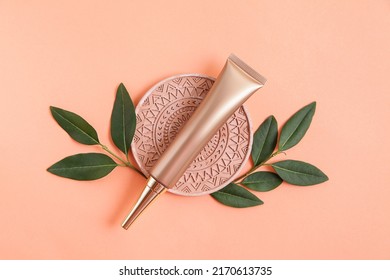 Golden cosmetic tube light pastel color Mandala background. Natural minimalism look, Minimal styling, still life. branding layout, skin care ad mock up - Shutterstock ID 2170613735