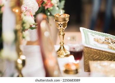 Golden crowns lying on the table in church - Shutterstock ID 2250683089